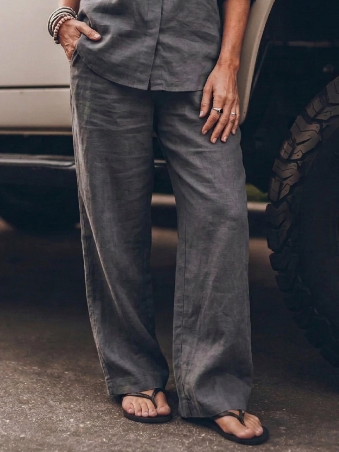 Model wearing oversized 100% cotton shirt and wide-leg pants co-ord set in neutral color