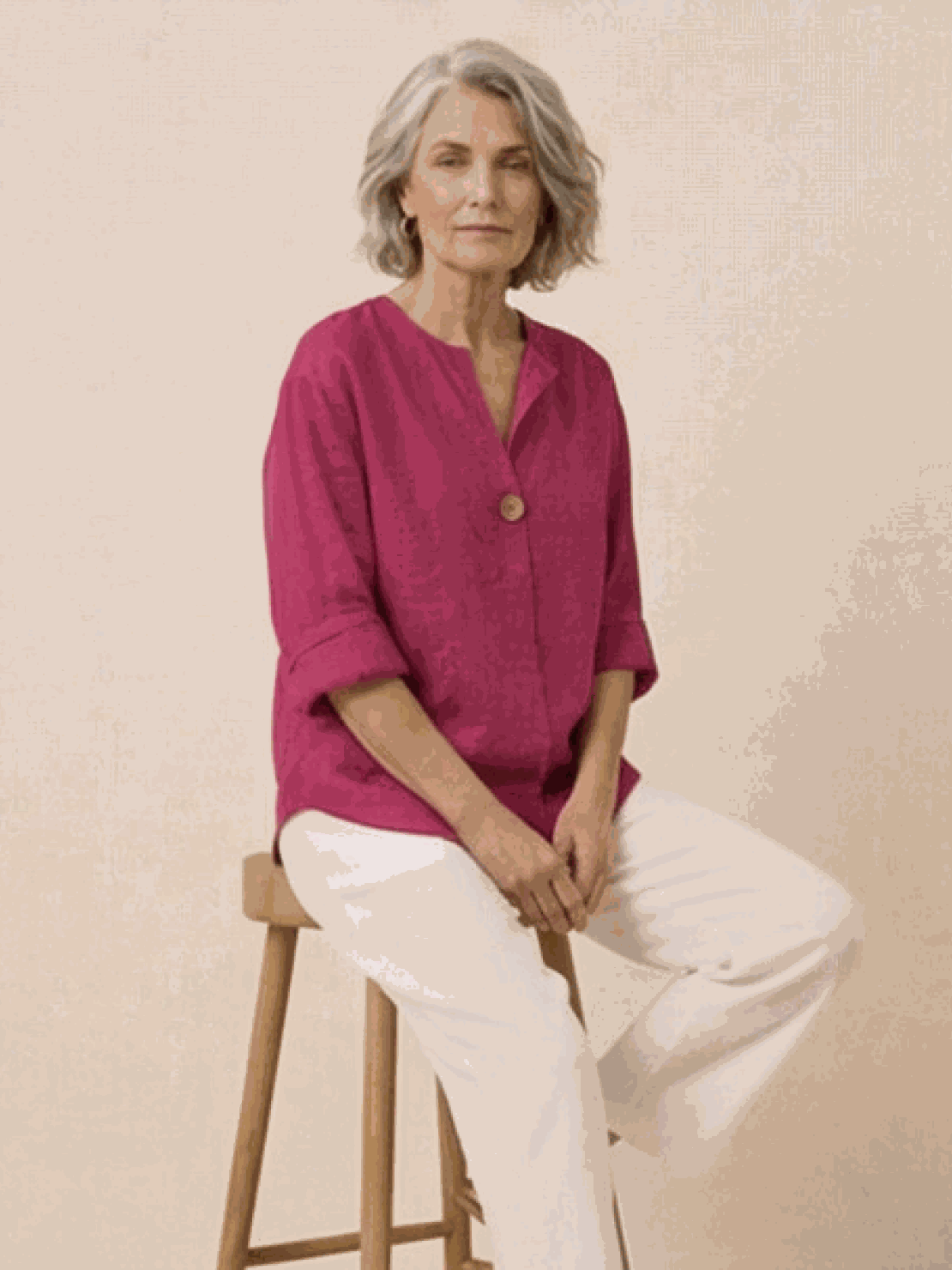 white pure linen age-defying button detail shirt on wooden hanger