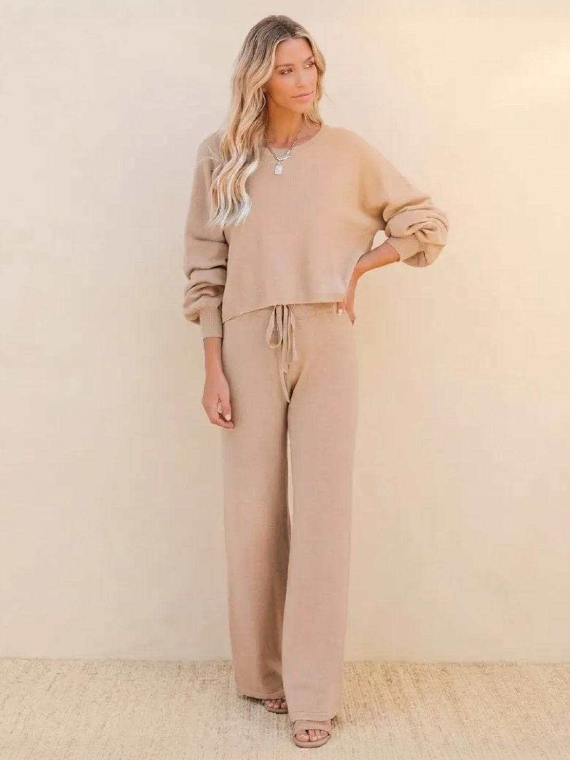 woman wearing beige round neck loose fit cozy two-piece set with long sleeves and wide-leg pants
