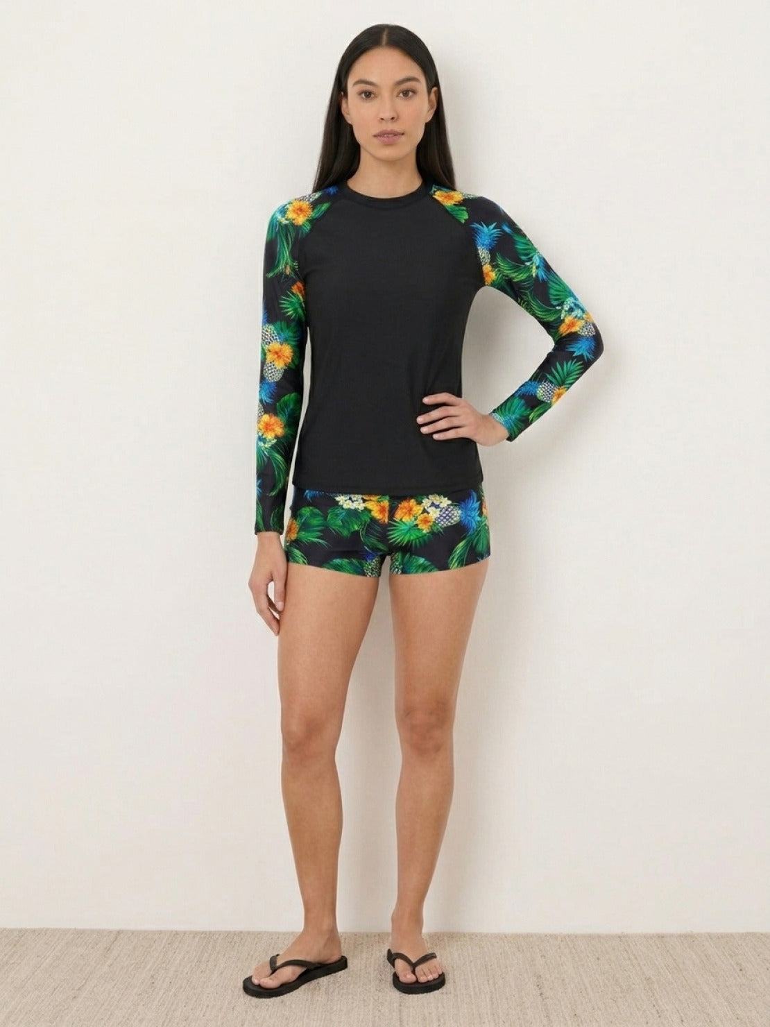 Long-sleeve swim rash guard top with matching mid-rise boyshort swim shorts in quick-dry stretch fabric