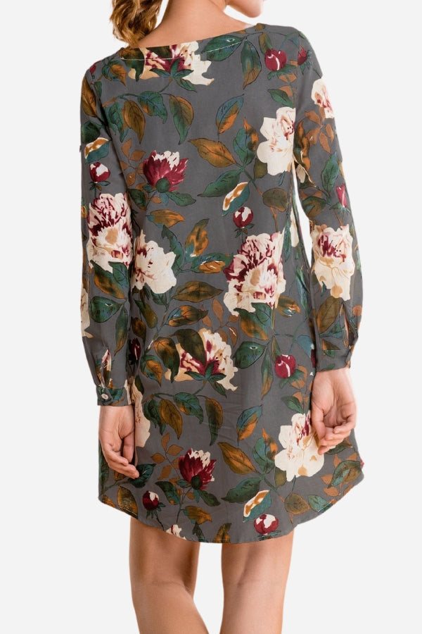 Back view of all over floral print linen shift dress with long sleeves and relaxed fit