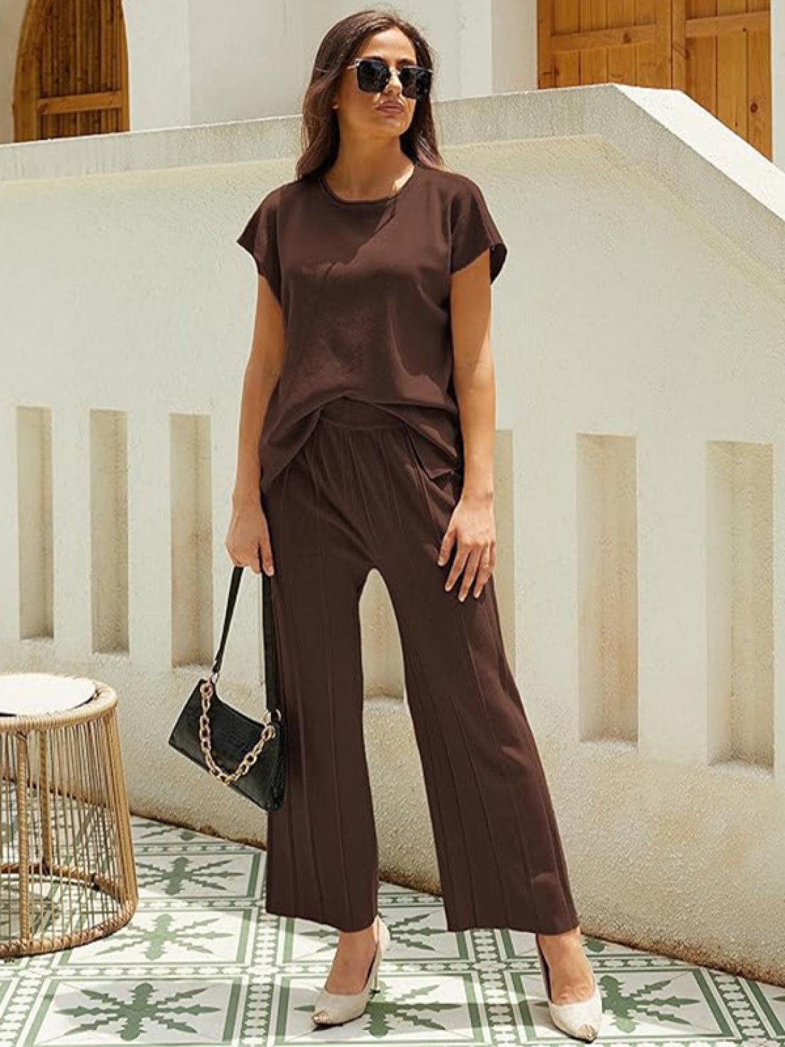 First Class Travel two-piece set in soft viscose-acrylic blend with pleated wide-leg pants and matching top for wrinkle-resistant comfort and versatile elegance