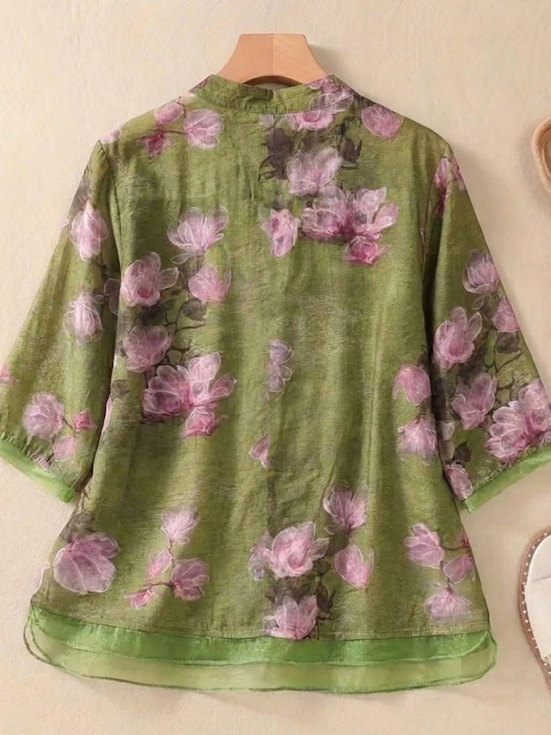 French boutique style organza blouse with elegant floral print and lightweight luxury fabric