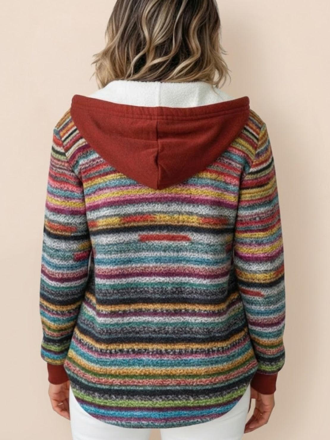 Highland Plaid Shacket with soft fleece lining, attached hood, button-front, and front pockets in classic plaid pattern.