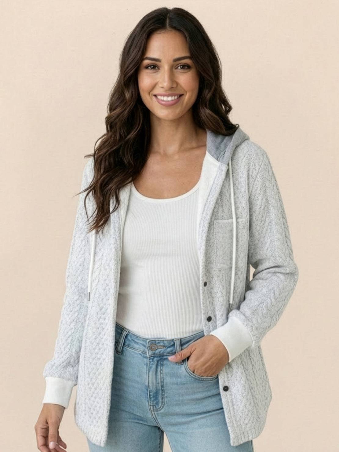 Highland Plaid Shacket with soft fleece lining, button-front, attached hood, and cozy plaid pattern for cool weather layering