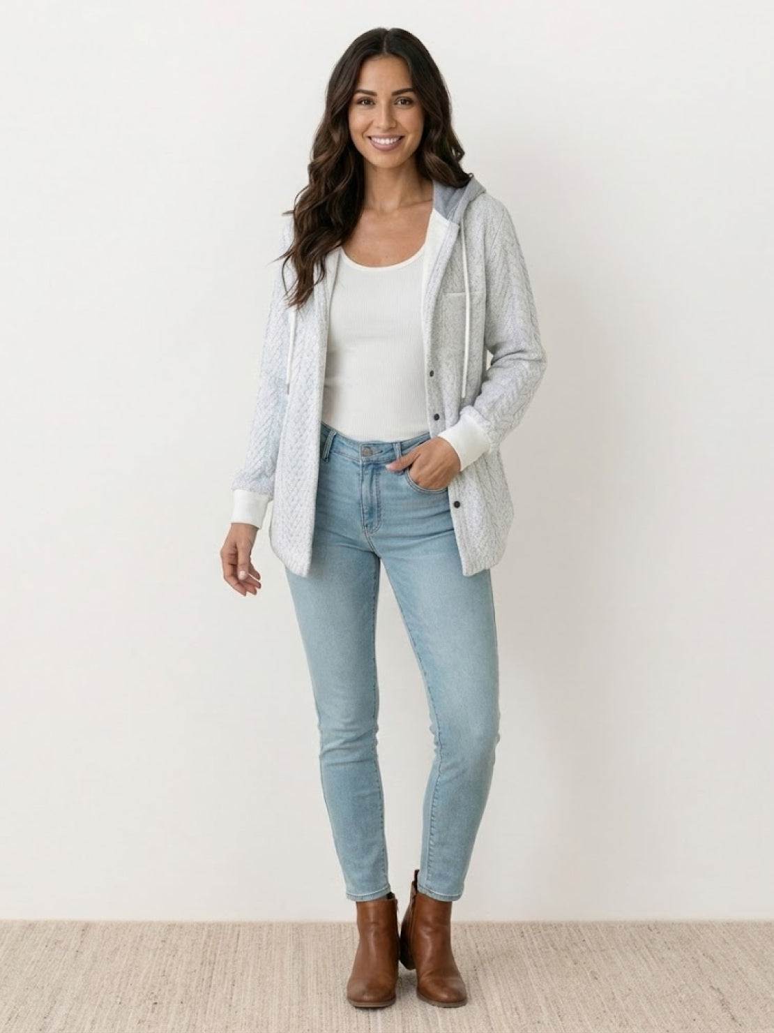 Highland Plaid Shacket with soft fleece lining, hood, button-front, and plaid pattern for cozy layering