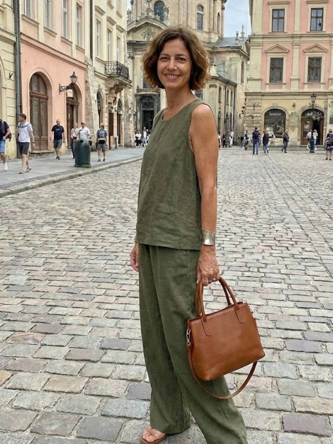 loose solid color sleeveless two-piece set with oversized fit and wide-leg pants