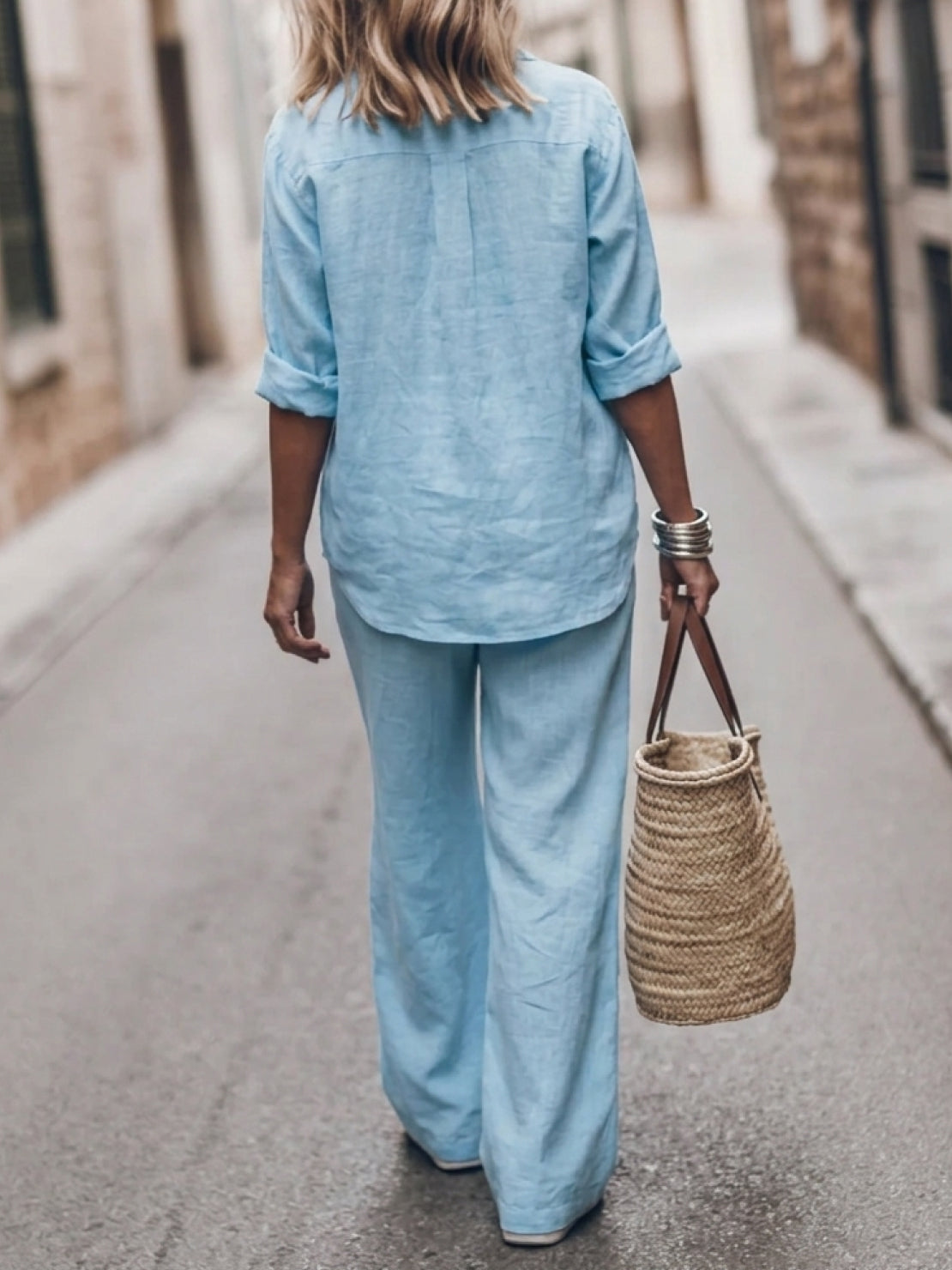Model wearing oversized 100% cotton shirt with wide-leg pants co-ord set in relaxed fit