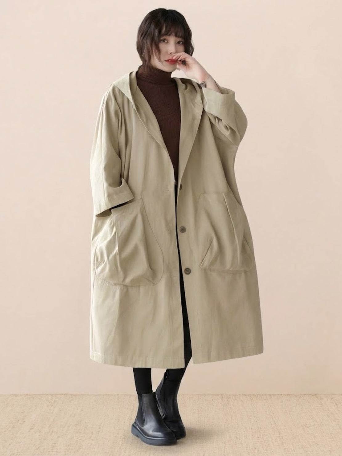 One size waterproof oversized windbreaker jacket with hood and large pockets for versatile layering and stylish coverage