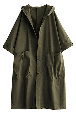 Oversized water resistant windbreaker jacket with hood and large front pockets in dark green