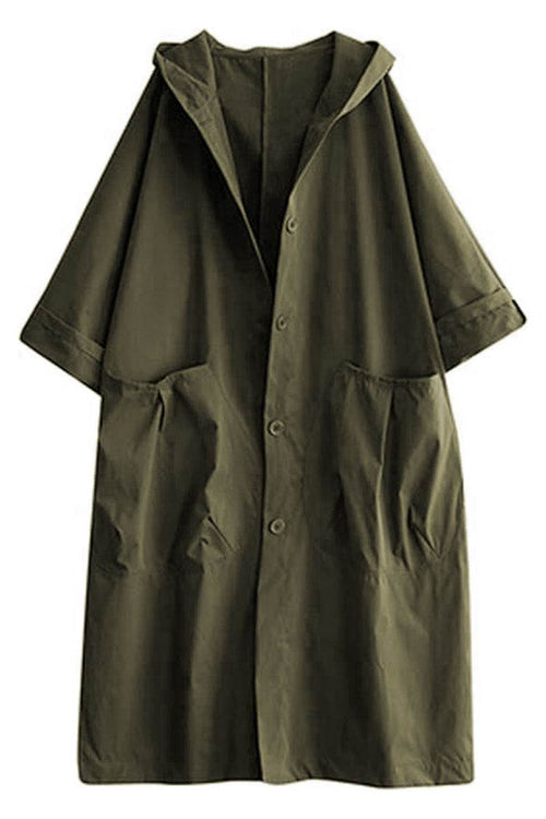 Oversized dark green water-resistant windbreaker jacket with hood and large front pockets, waterproof design
