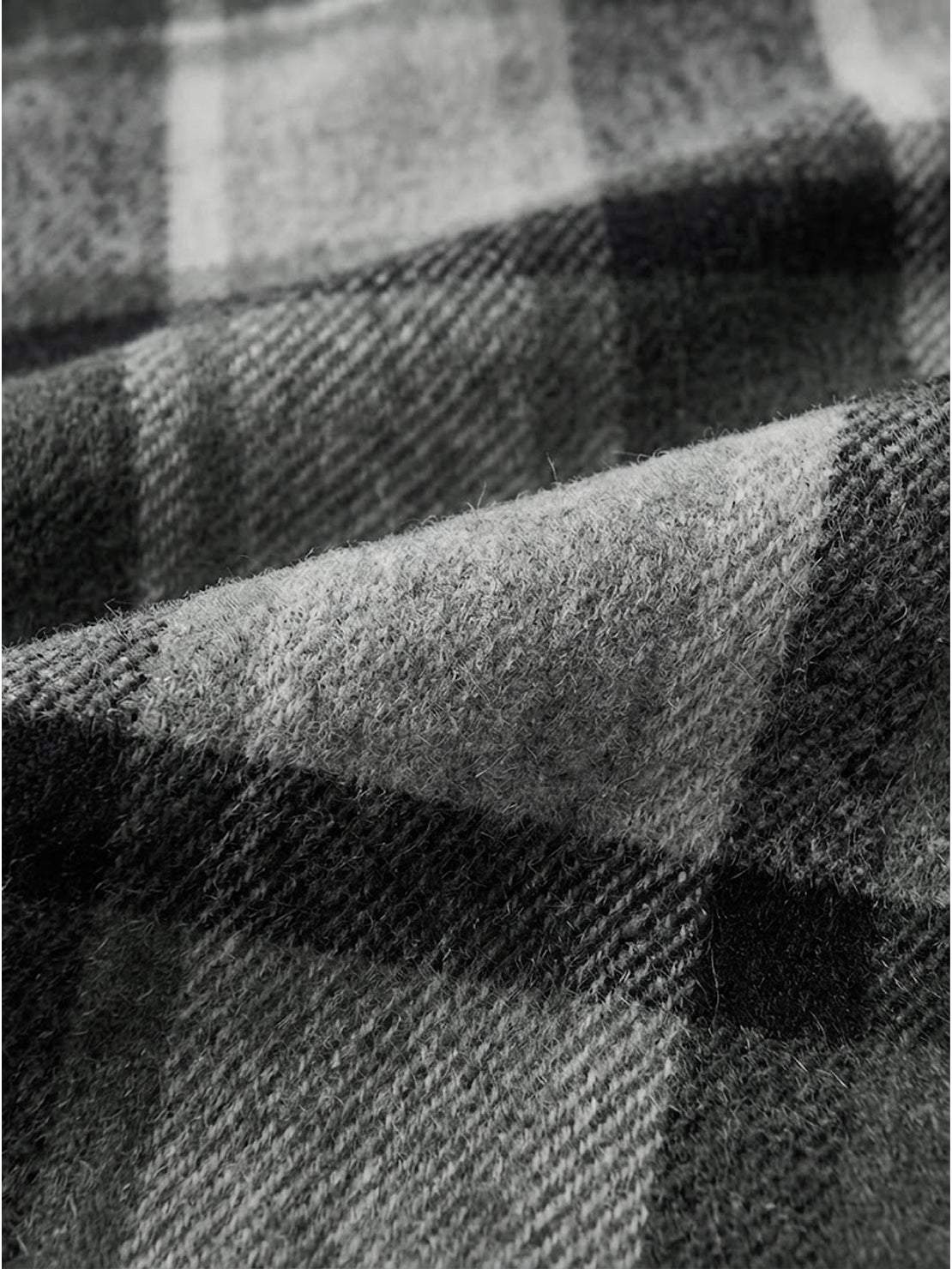 Oversized medium-length blue plaid wool-blend overshirt with functional pockets and relaxed fit