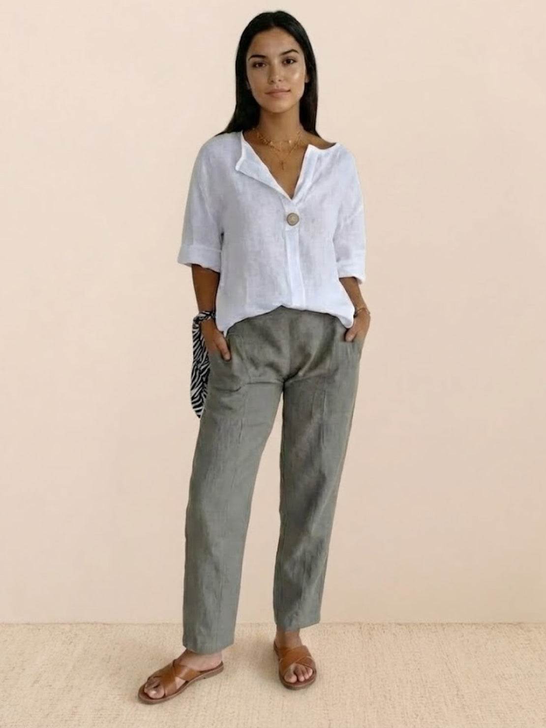 white pure linen age-defying shirt with button detail on hanger