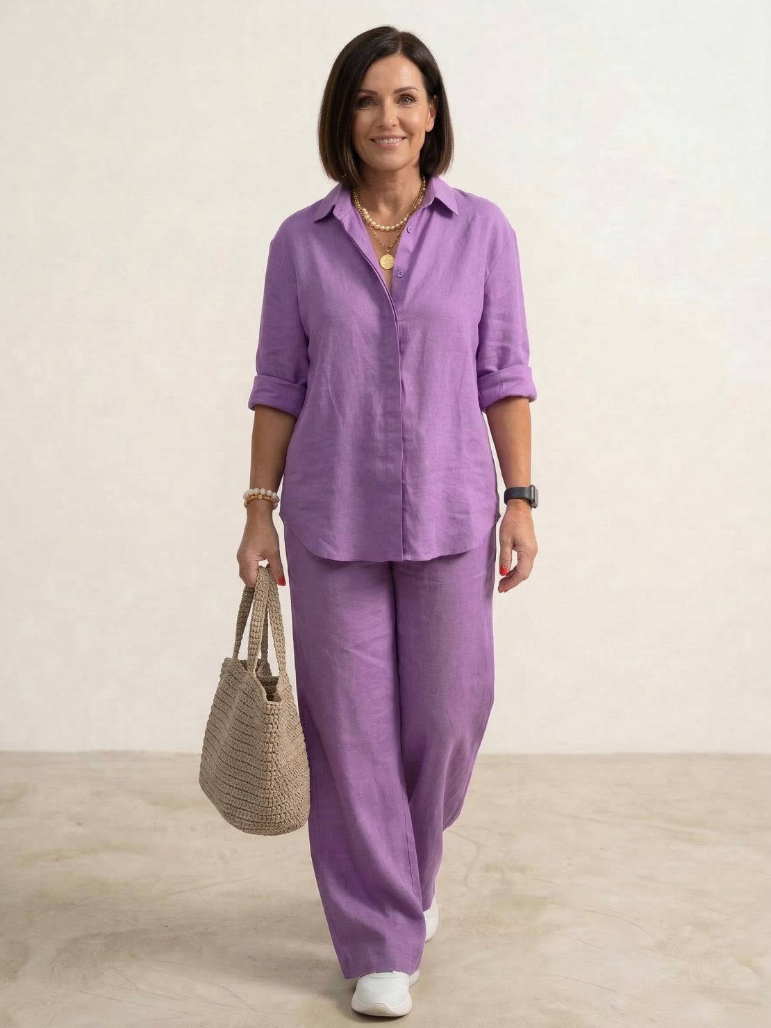 Woman wearing oversized 100% cotton shirt and wide-leg pants co-ord set