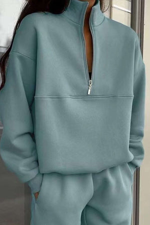 Mint green cotton blend tracksuit with zip neckline and stretch waistband for tailored comfort