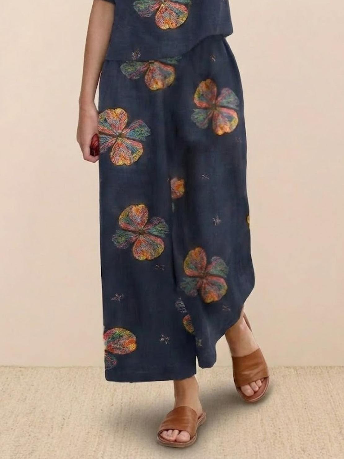 Floral print wide-leg pants from loose fit co-ord set with relaxed, breezy design and elastic waistband.