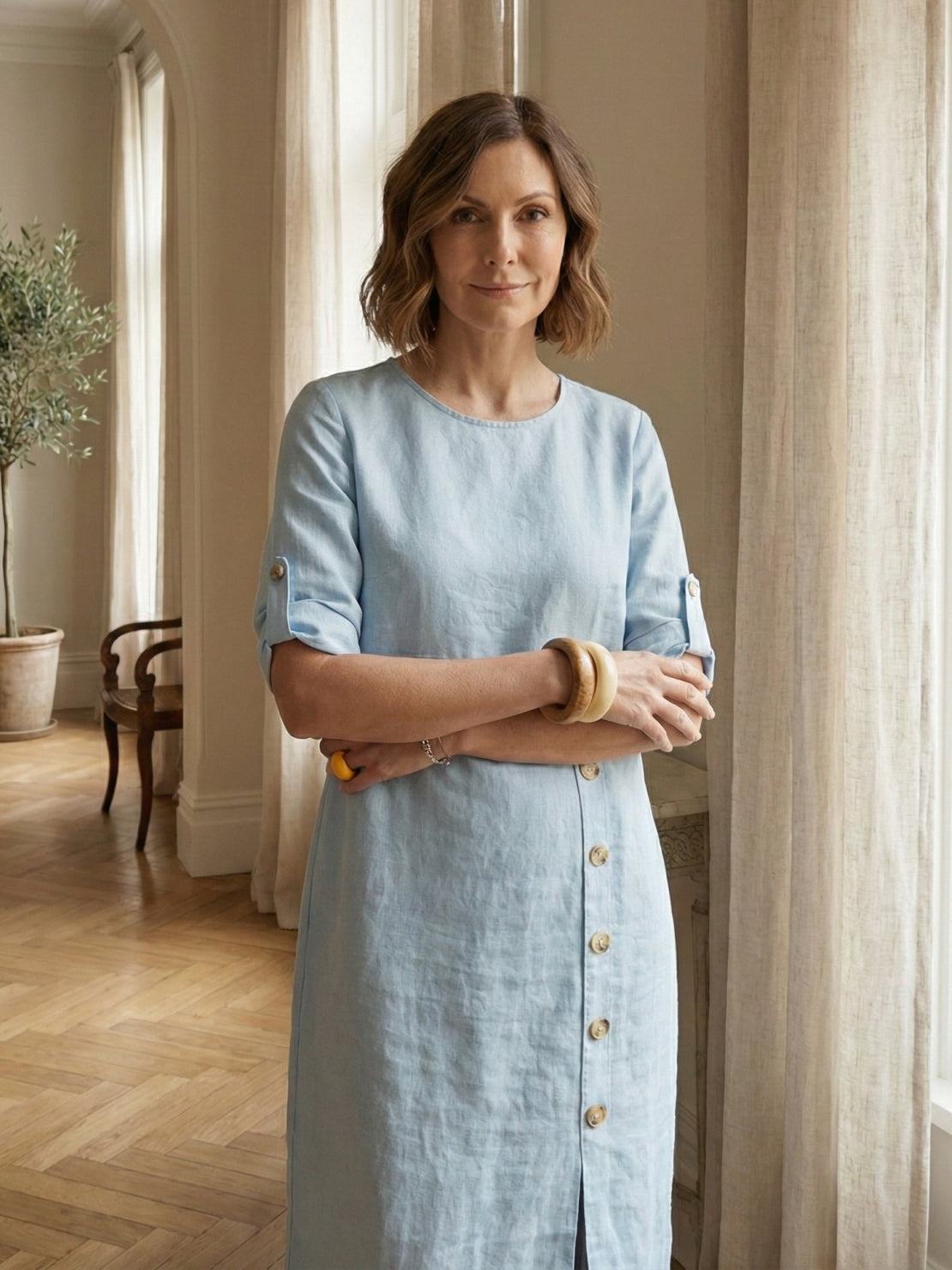 white Pure Cotton Elegance dress on mannequin with clean background