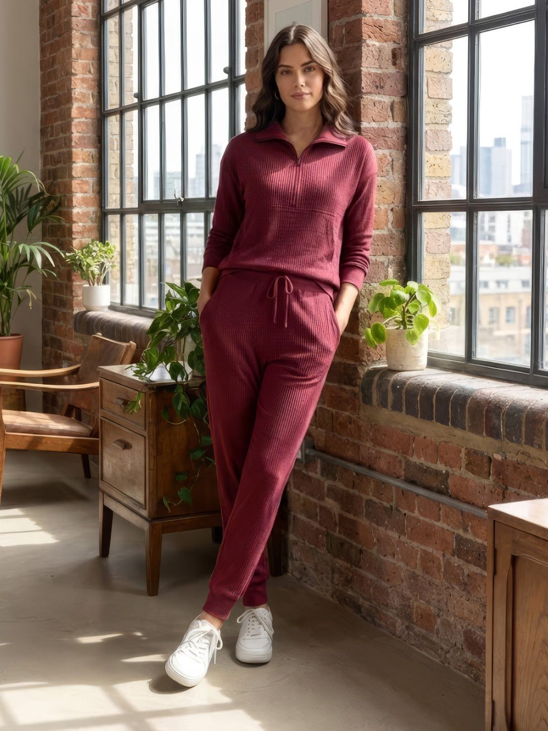 Unisex half-zip pullover and sweatpants set in soft fabric for relaxed fit and everyday comfort