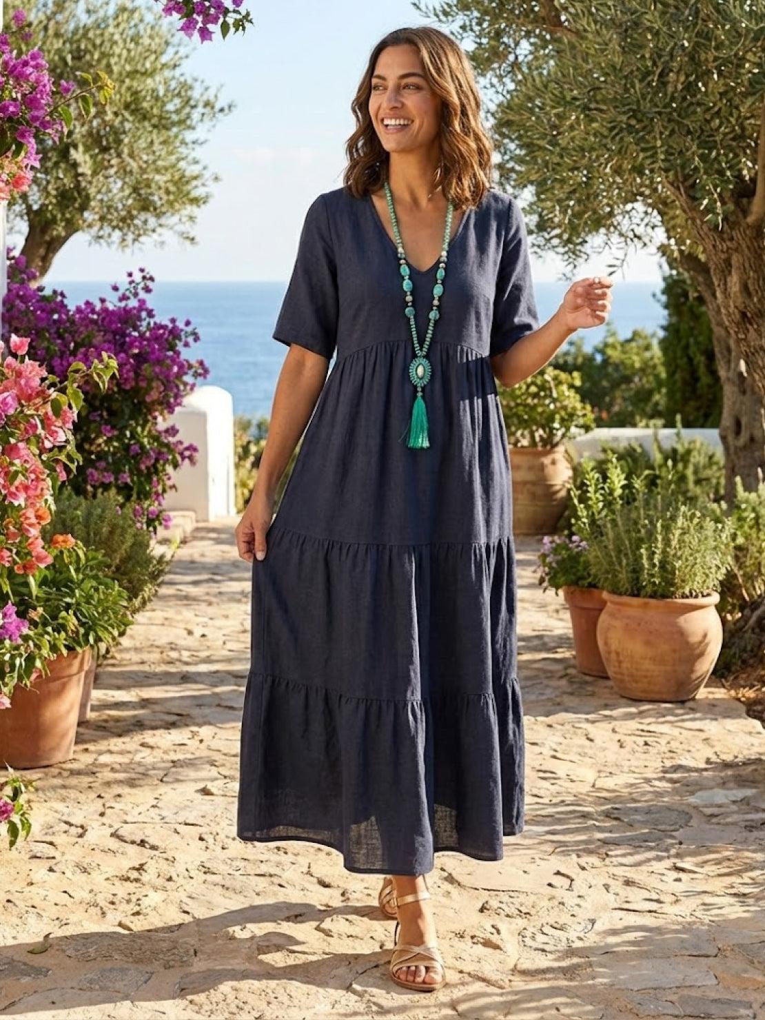 V-neck two-tiered maxi swing dress in flowing cotton fabric with irregular hemline and loose sleeves