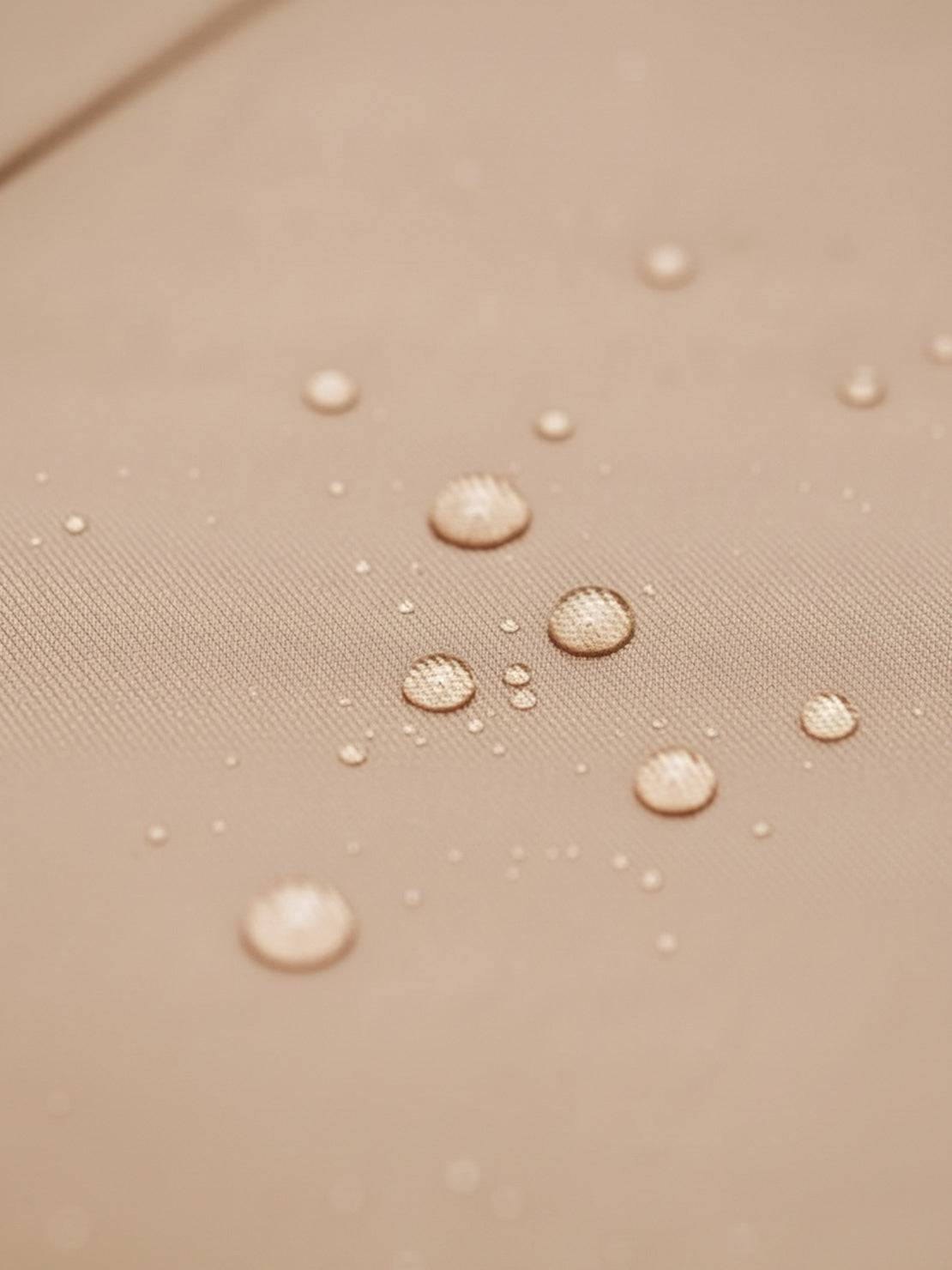 Elegant water-repellent rain A-line hooded raincoat for women with insulated lining and matching belt