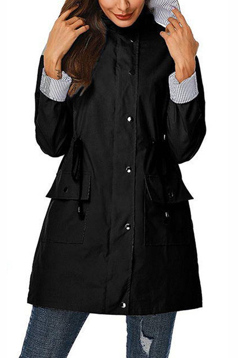 Women's black water resistant windbreaker jacket with hood and striped cuffs
