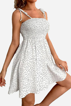White bohemian skater dress with black polka dots and sling knot straps, summer mini dress.