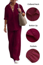 Woman wearing relaxed shirt and trousers two-piece set in burgundy with collared neck, button-up front, and pockets.