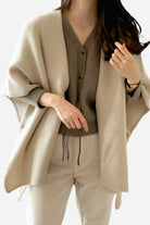 Relaxed flowy open front knitwear cardigan in beige with loose fit and soft texture