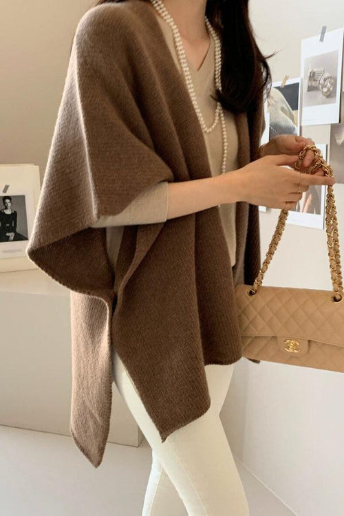 Relaxed flowy open front knitwear cardigan in brown with soft drape and cozy lightweight fabric.