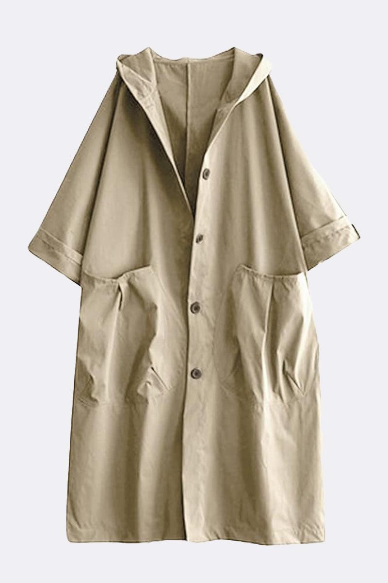 Oversized water resistant windbreaker jacket with hood and front pockets in beige color