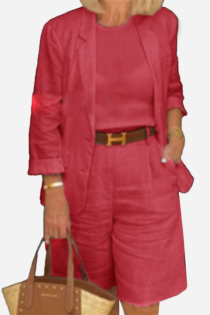 Red blazer and high-waisted shorts two-piece set with fitted silhouette and rolled-up sleeves.