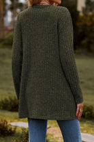 Lightweight ultra soft long knit cardigan with ribbed texture and long sleeves seen from back