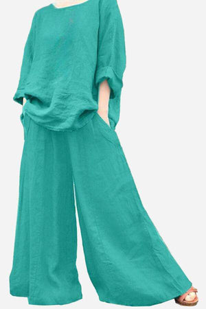 Teal wide leg pants with pockets paired with loose matching top, comfortable and airy outfit for casual wear