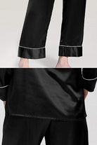 Black long sleeve silk pajamas with contrast piping on cuffs and relaxed fit pants