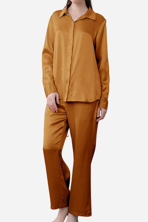 Woman wearing classic full-length Mulberry silk sleepwear set in warm brown color