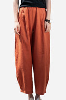 Rust-colored Ramie Linen Cotton Pants with relaxed fit and breathable fabric.