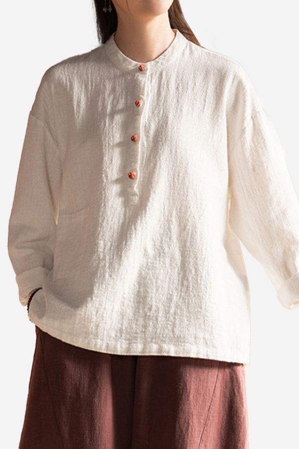 One size fit all ramie linen and cotton blouse with long sleeves and buttoned front in natural beige color