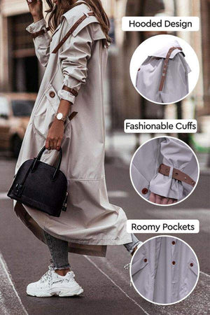 Woman wearing beige minimalist hooded coat with fashionable cuffs and roomy pockets, styled for urban travel.