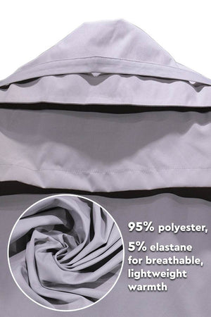 Lightweight minimalist hooded coat made of 95% polyester and 5% elastane for breathable warmth.