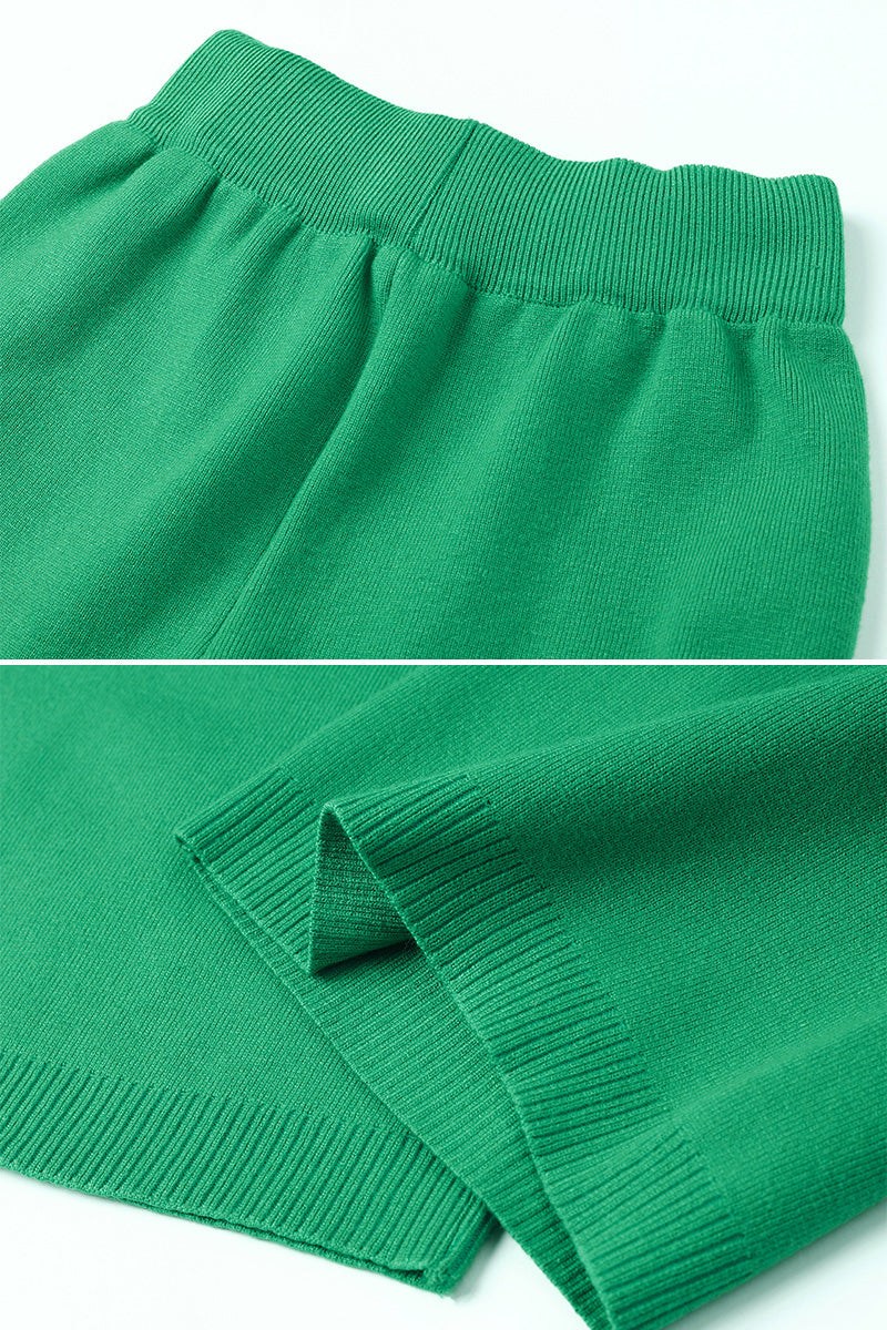 Close-up of green knitted turtleneck two-piece set fabric and ribbed cuffs
