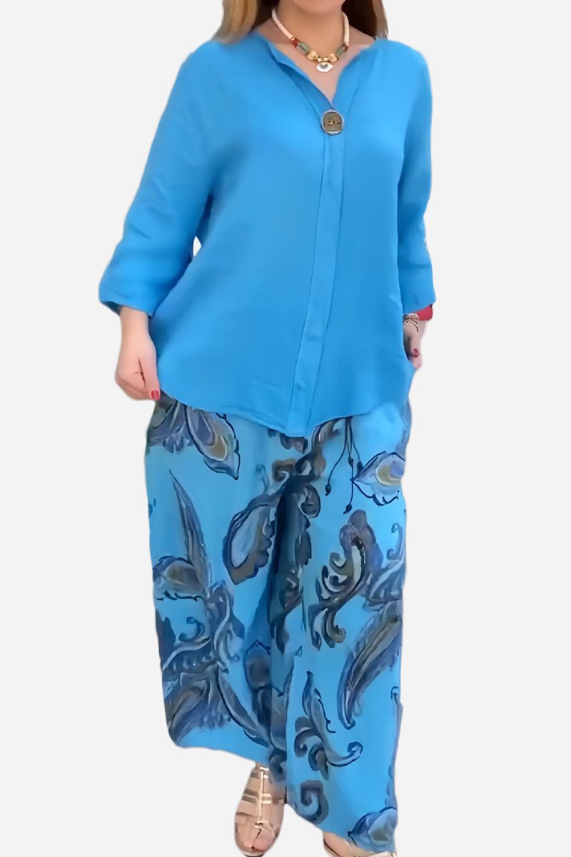Vibrant Fusion Two-Piece Set with blue solid top and printed wide-leg pants in premium stretch fabric