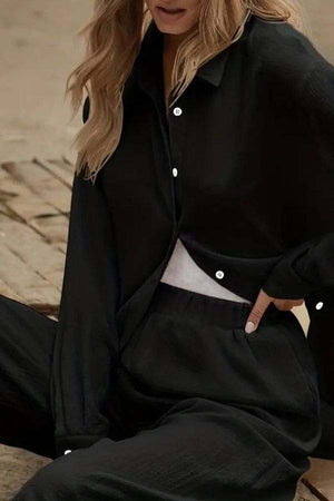 Black cotton-linen two-piece set with button-up top and relaxed pants for casual comfort
