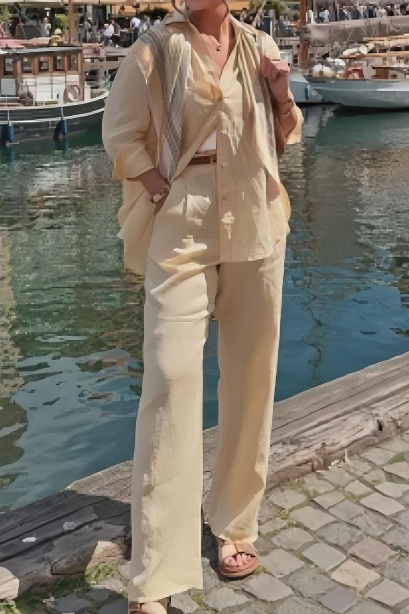 Woman wearing beige Linen Blend Two-Piece Set by waterfront dock with boats in background