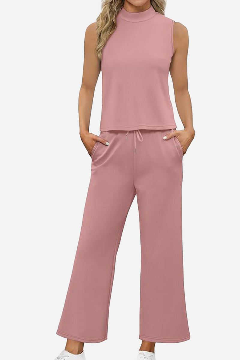 Cotton Chic Sleeveless two-piece set in soft pink with sleeveless top and wide-leg pants with pockets