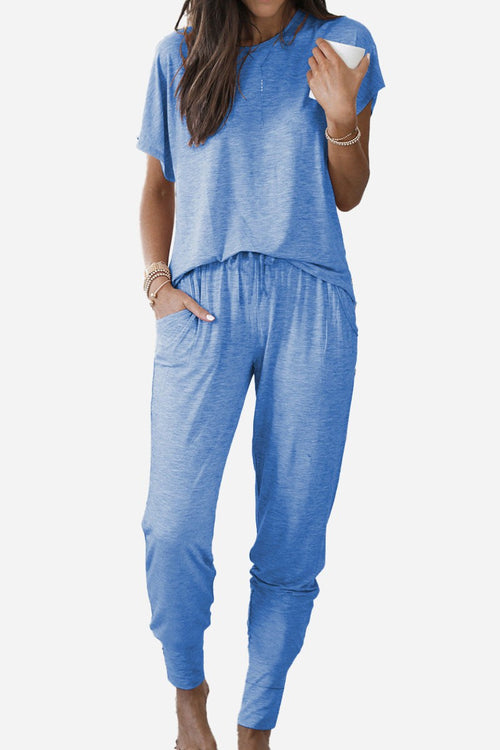 Woman wearing blue ultra-soft two-piece loungewear set with relaxed fit and jogger pants