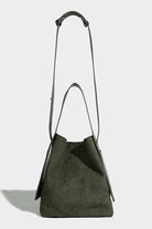 Dark green suede Vintage Charm Bag with dual-length straps and spacious design