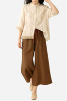 Women’s Cotton Linen Tuscany two-piece set with sheer embroidered top and wide-leg brown linen trousers