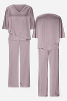 Elegant Layers Two-Piece Set with layered V-neck top and comfortable pants in soft, wrinkle-resistant fabric.