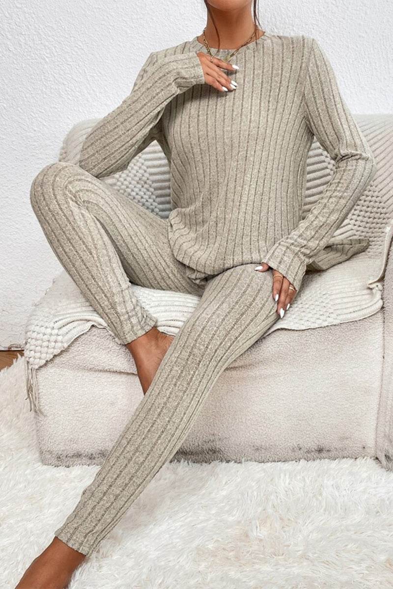 Woman wearing beige Butter Touch Ribbed Two-Piece Set with ribbed texture sitting on couch