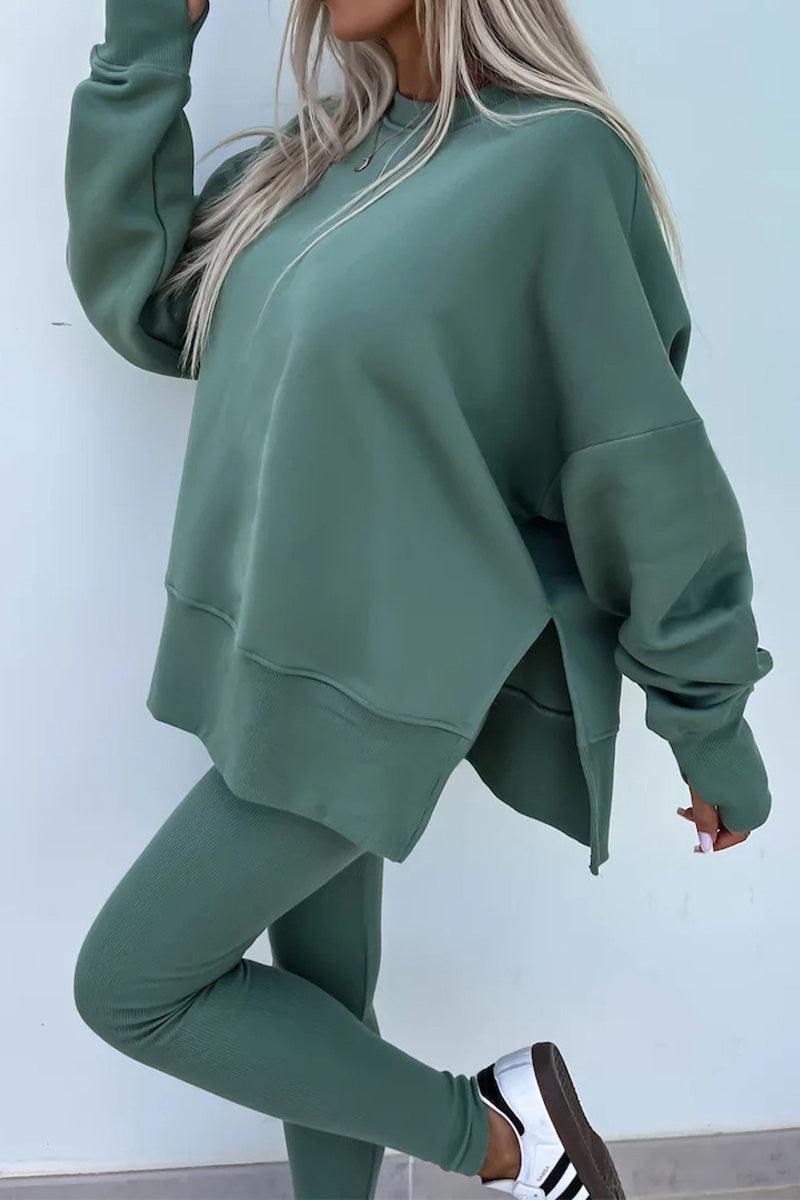 Woman wearing TimelessChic Ultra Comfortable Two-Piece Set in green, featuring a relaxed top and high-waisted leggings.